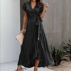Classy Black and white polka dot wrap dress, tie closure just below the bust.